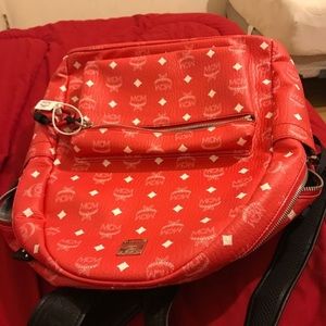Mcm backpack with dust bag and papers